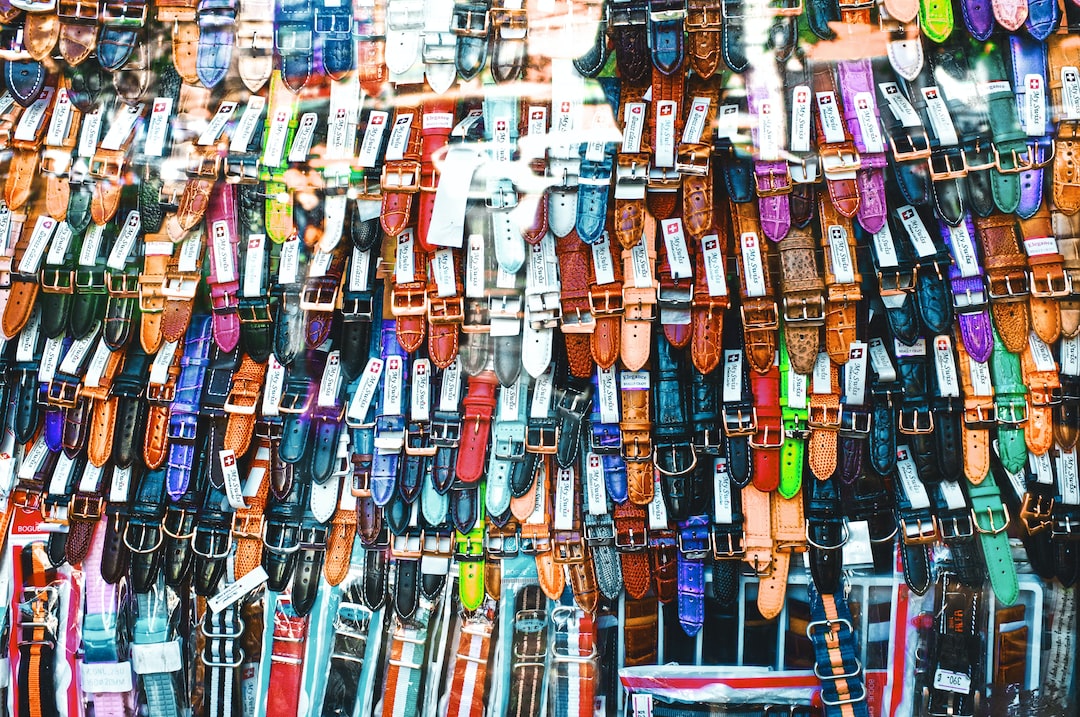 Wall of random guitar straps. 