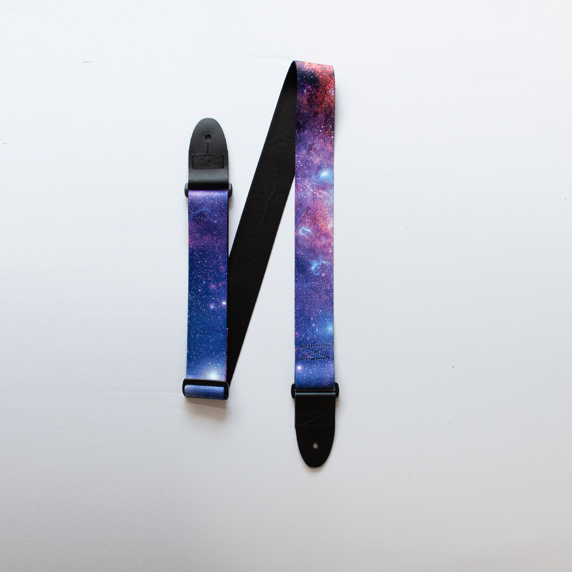 Space style guitar strap.