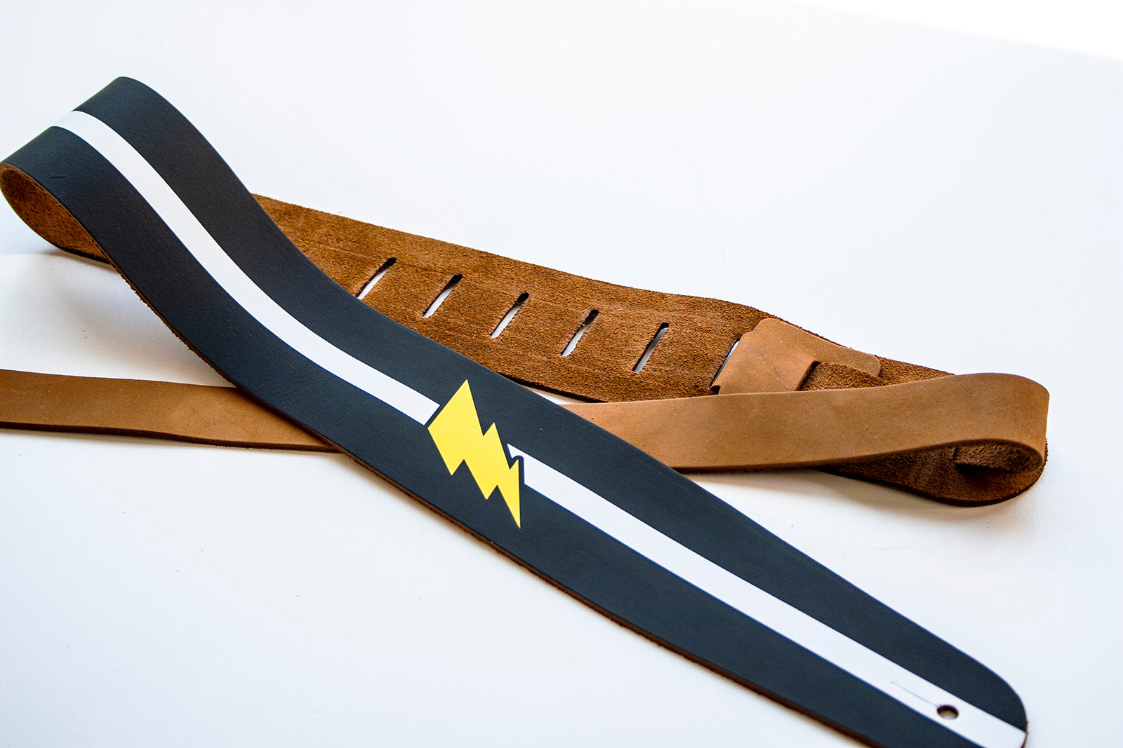 Cool guitar strap with lightning bolt. 