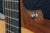 Guitar Strap Button on a Acoustic Guitar. 