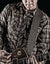 Guitar Player playing a electric guitar with a leather guitar strap.
