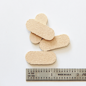 1.2" x 0.5″ Pill Shape USA - Made Leather Floor Protector Pads (4 - Pack) – Durable Alternative to Felt - StrapGraphics