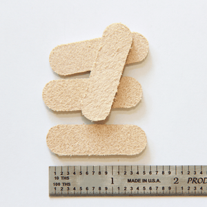 1.4" x 0.5″ Pill Shape USA - Made Leather Floor Protector Pads (4 - Pack) – Durable Alternative to Felt - StrapGraphics