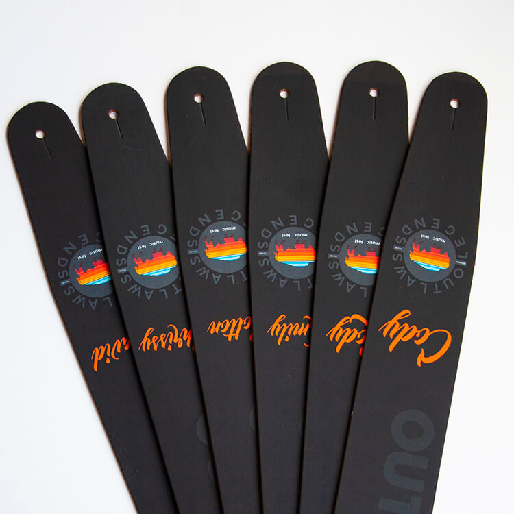 Customized guitar straps with printed names and logos, adding a personal touch to your instrument.