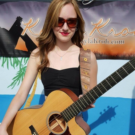 girl with guitar strap